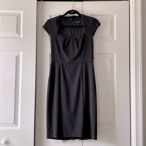 Black form fitting dress for work or play